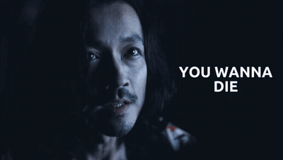 A Close Up Of A Man 'S Face With The Words You Wanna Die Behind Him GIF