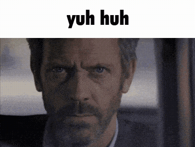 A Close Up Of A Man 'S Face With The Words Yuh Huh Written Above Him GIF