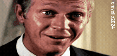 A Close Up Of A Man 'S Face With The Year 2024 GIF