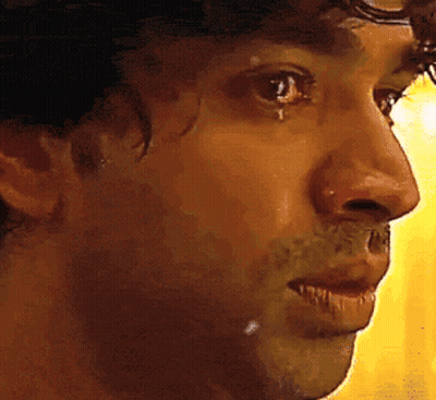 A Close Up Of A Man 'S Face With Water Coming Out Of His Nose GIF