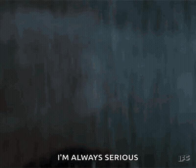 A Close Up Of A Man 'S Face With Water Drops On It And The Words I 'M Always Serious . GIF