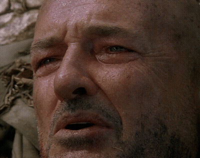 A Close Up Of A Man 'S Face With Water On His Face GIF