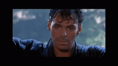 A Close Up Of A Man 'S Face With Water On His Face GIF