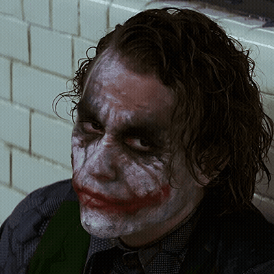 A Close Up Of A Man 'S Face With White Paint GIF