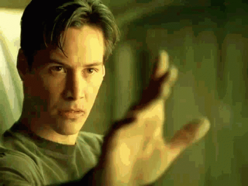 A Close Up Of A Man 'S Hand Reaching Out GIF