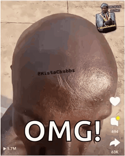 A Close Up Of A Man 'S Head With The Word Omg Written On It . GIF