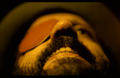 A Close Up Of A Man 'S Mouth With A Beard GIF