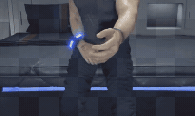 A Close Up Of A Man 'S Muscles In A Gym . GIF