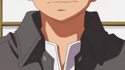A Close Up Of A Man 'S Neck With A Black Jacket On GIF