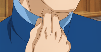 A Close Up Of A Man 'S Neck With A Blue Shirt GIF