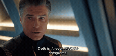 A Close Up Of A Man Saying Truth Is I Never Liked The Holograms GIF