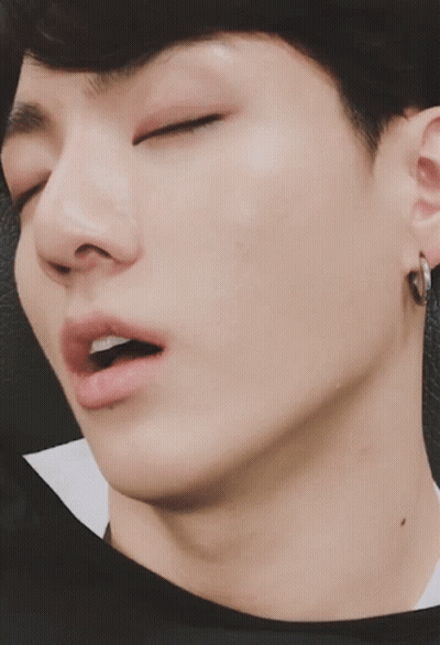 A Close Up Of A Man Sleeping With His Eyes Closed GIF