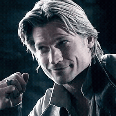 A Close Up Of A Man Smoking A Cigarette In A Dark Room . GIF