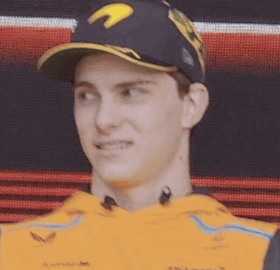 A Close Up Of A Man Wearing A Baseball Cap And A Yellow Shirt . GIF