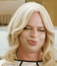 Man With Blonde Wig Making Funny Face GIF