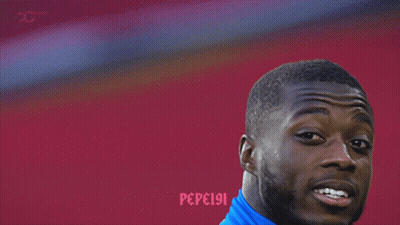 A Close Up Of A Man Wearing A Blue Shirt That Says Pepsi GIF