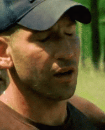 A Close Up Of A Man Wearing A Hat GIF