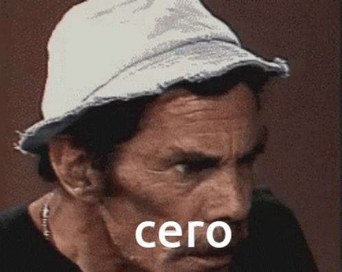 A Close Up Of A Man Wearing A Hat With The Word Cero On His Face GIF