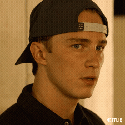 A Close Up Of A Man Wearing A Hat With The Word Netflix On The Bottom Right GIF