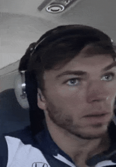 A Close Up Of A Man Wearing A Helmet And Sunglasses . GIF