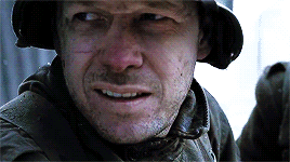 A Close Up Of A Man Wearing A Helmet Smiling GIF