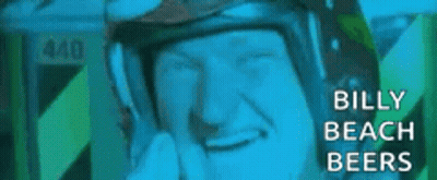 A Close Up Of A Man Wearing A Helmet With The Words `` Billy Beach Beers '' On It . GIF