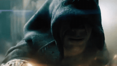 A Close Up Of A Man Wearing A Hood And Smiling GIF