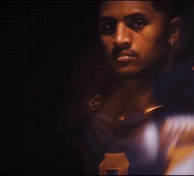 A Close Up Of A Man Wearing A Jersey With The Number 7 On It GIF