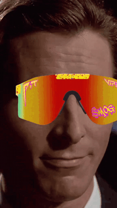 A Close Up Of A Man Wearing A Pair Of Sunglasses That Says ' Enjoy ' On Them GIF
