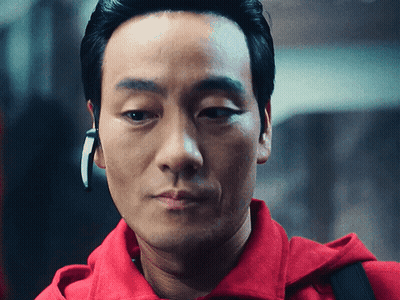 A Close Up Of A Man Wearing A Red Hoodie GIF