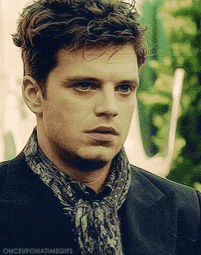 A Close Up Of A Man Wearing A Scarf And A Jacket . GIF