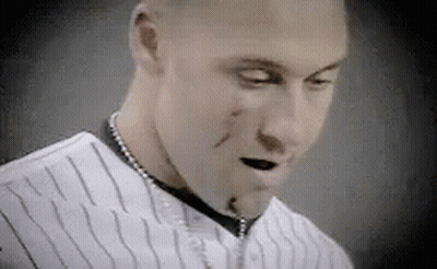 A Close Up Of A Man Wearing A Striped Shirt And A Necklace GIF