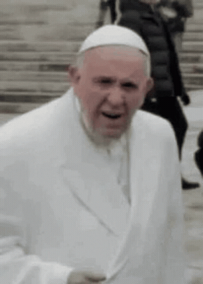 A Close Up Of A Man Wearing A White Suit And Hat . GIF