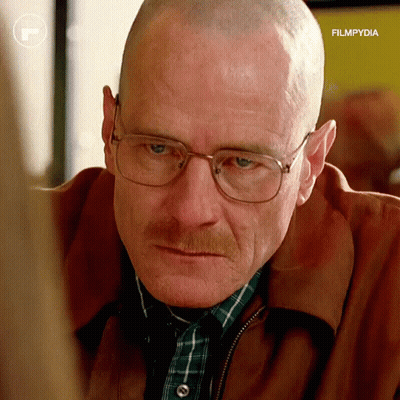 A Close Up Of A Man Wearing Glasses And A Plaid Shirt With Filmpydia Written On The Bottom GIF