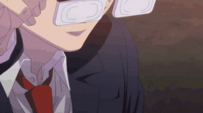 A Close Up Of A Man Wearing Glasses And A Tie GIF