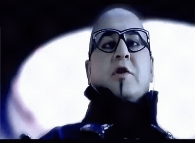 A Close Up Of A Man Wearing Glasses And Headphones . GIF