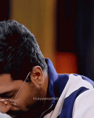 A Close Up Of A Man Wearing Glasses With The Caption Vickyismylifeline On The Bottom GIF