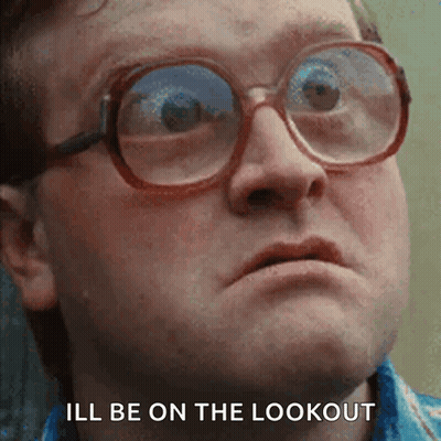 A Close Up Of A Man Wearing Glasses With The Words " Ill Be On The Lookout " Below Him GIF