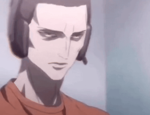 A Close Up Of A Man Wearing Headphones And A Microphone GIF