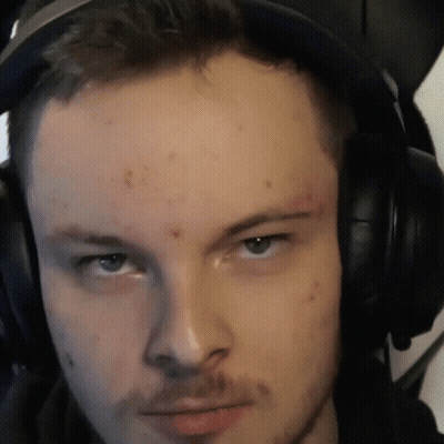 A Close Up Of A Man Wearing Headphones With A Beard GIF
