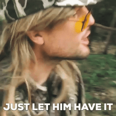 A Close Up Of A Man Wearing Sunglasses And A Hat With The Words `` Just Let Him Have It '' Written On It . GIF