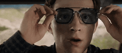 A Close Up Of A Man Wearing Sunglasses In A Car With A Surprised Look On His Face . GIF