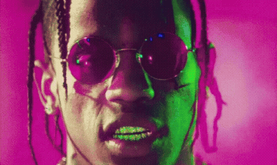 A Close Up Of A Man Wearing Sunglasses On A Purple Background . GIF