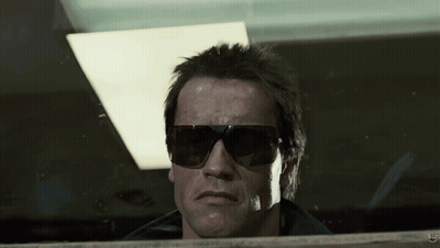 a close up of a man wearing sunglasses with the letters ff on the bottom right