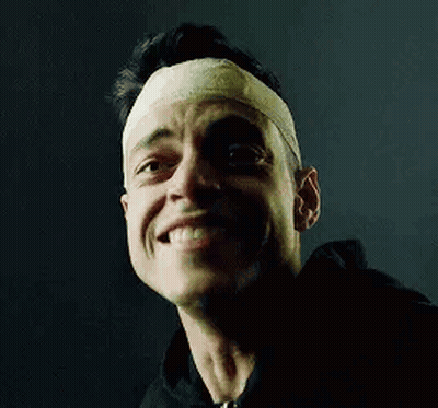 A Close Up Of A Man With A Bandage On His Head . GIF