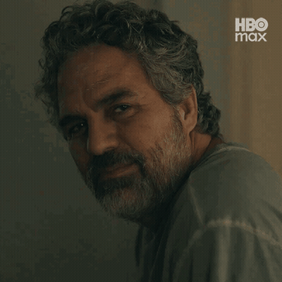 A Close Up Of A Man With A Beard And A Hbo Max Logo GIF