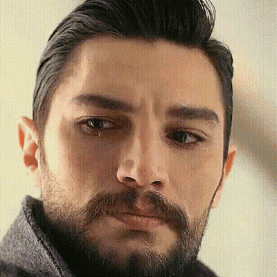A Close Up Of A Man With A Beard And Mustache GIF