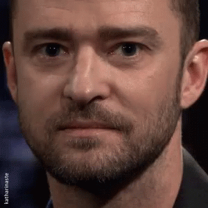 A Close Up Of A Man With A Beard And Mustache Making A Funny Face . GIF