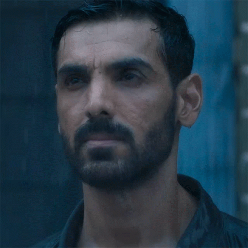A Close Up Of A Man With A Beard GIF