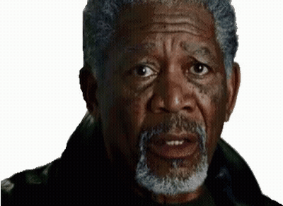 A Close Up Of A Man With A Beard Making A Funny Face . GIF
